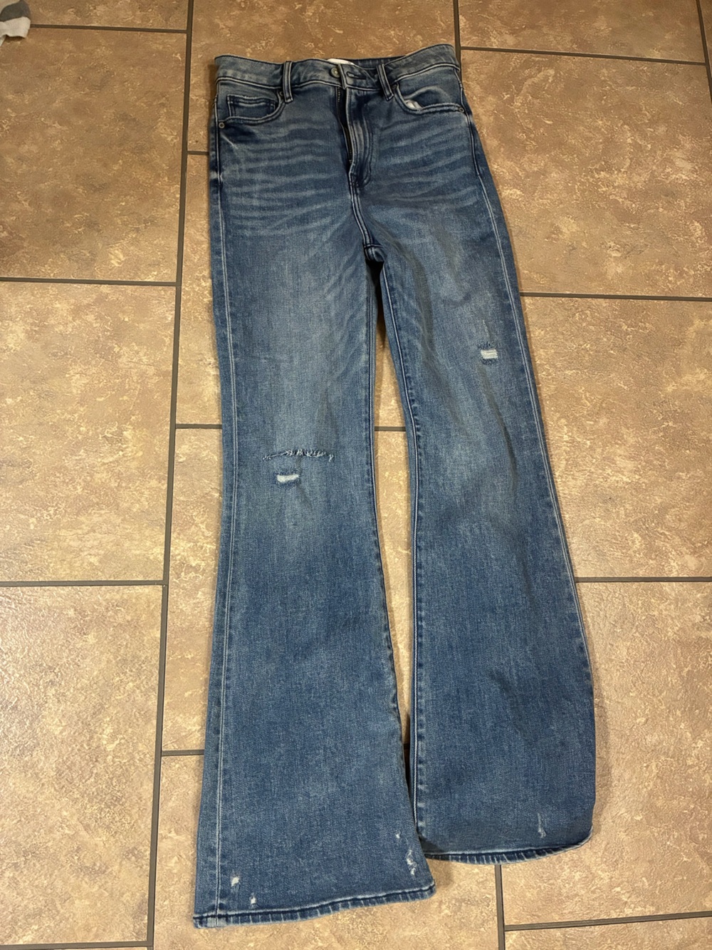 Distressed Blue Jeans